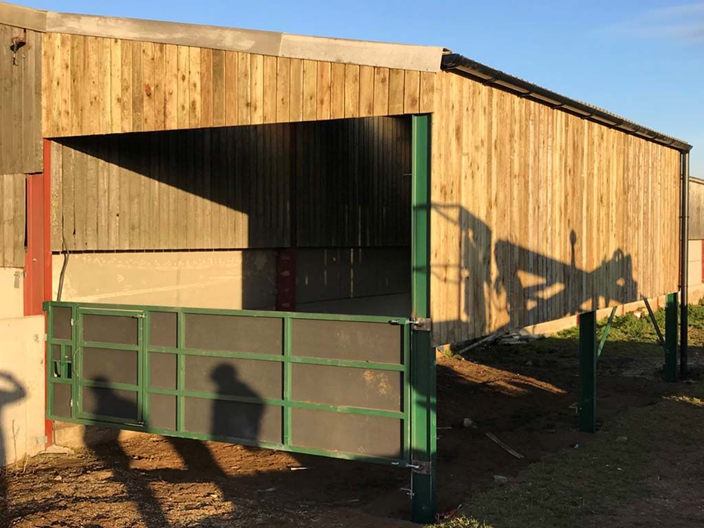 Inside farm shed with fresh groundworks